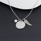 Angel Wing Necklace with Pearl - Engraved Round -  " A piece of my heart lives in heaven "
